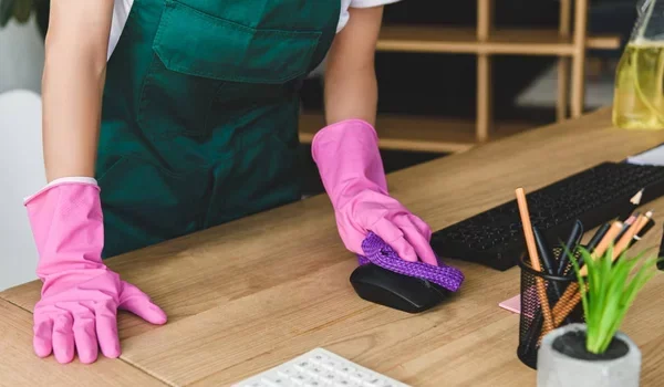depositphotos_207465776-stock-photo-cropped-shot-woman-rubber-gloves-e1710188472891